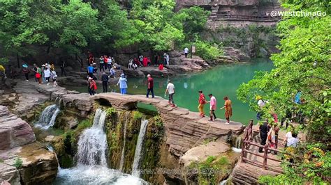 Yuntai Mountain Scenic Area: Mystical Caves and Breathtaking Panoramas Await!